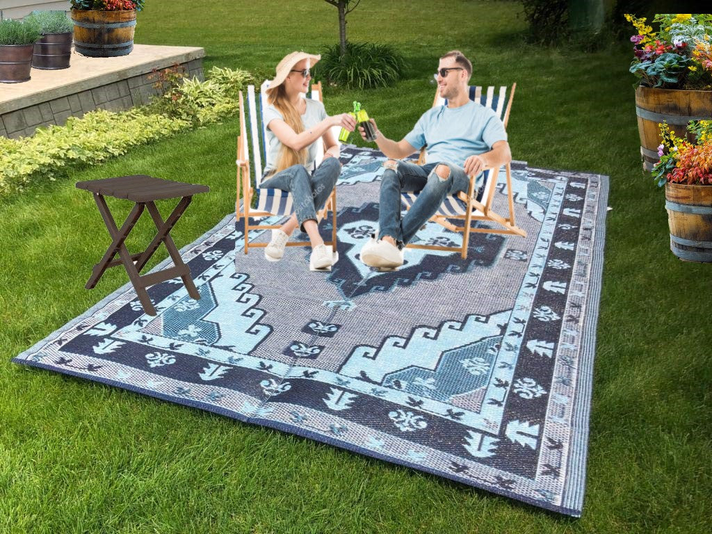 Outdoor Patio Rugs clearance Navy Blue, Grey, White color two people are using for out door